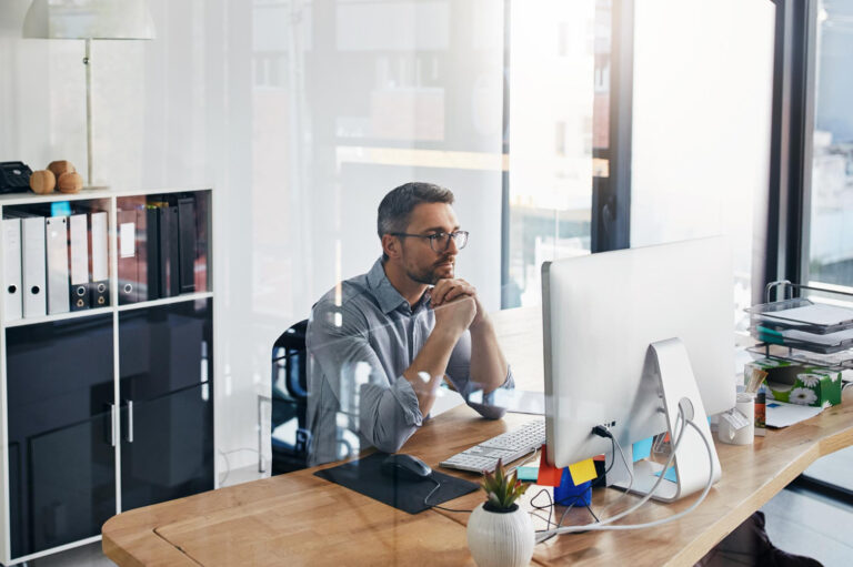 man working with a laptop