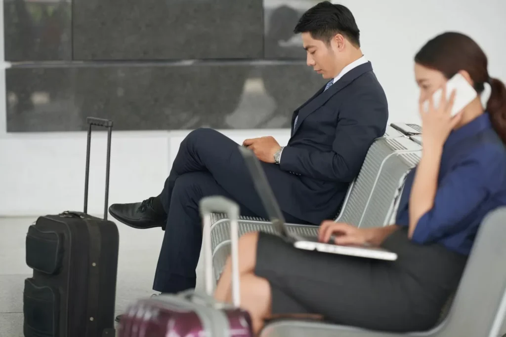 persons standing on chairs
