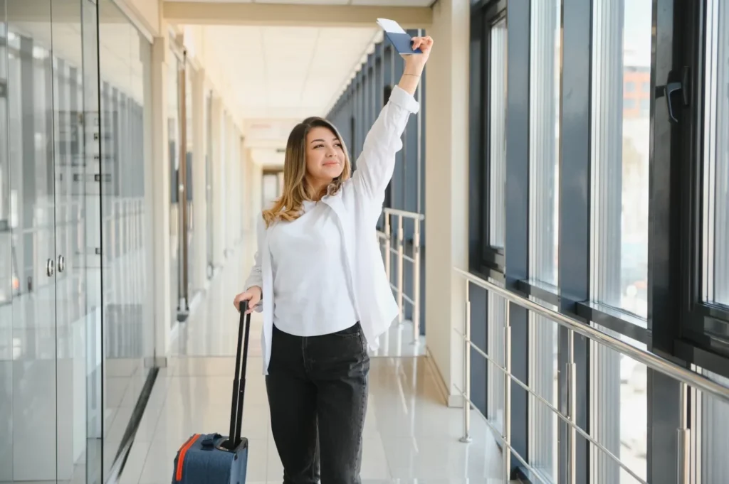 women with bag at airport