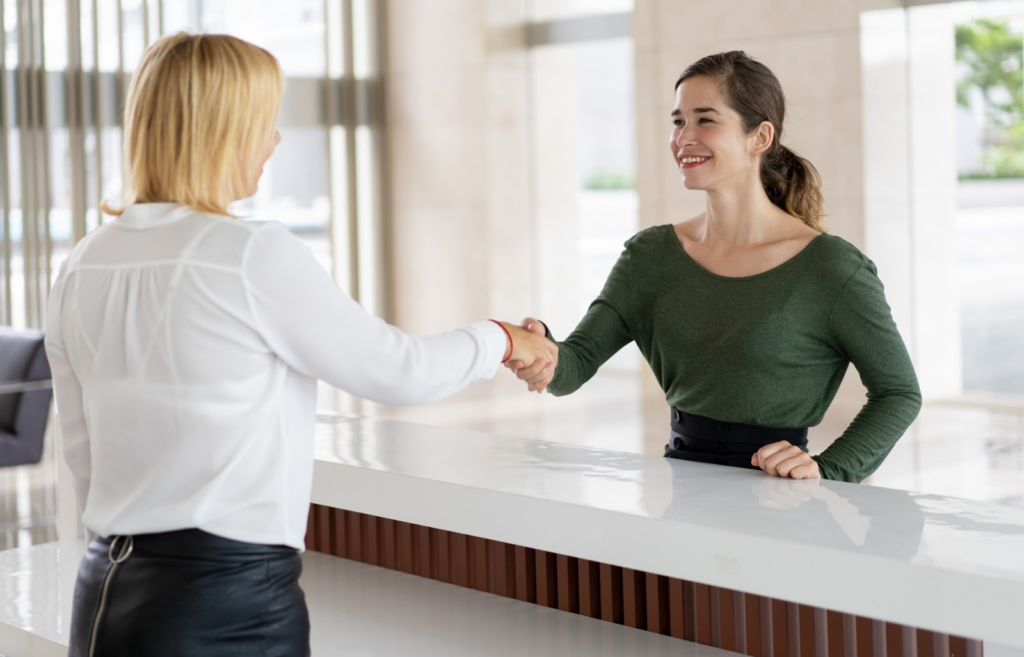 women shaking hands