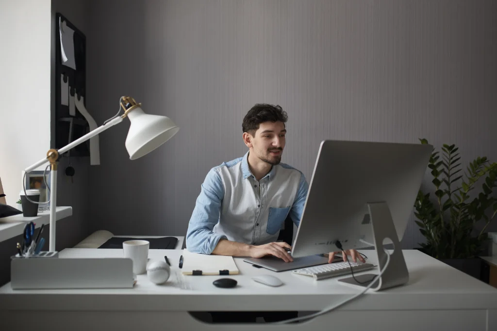 young man working on desk