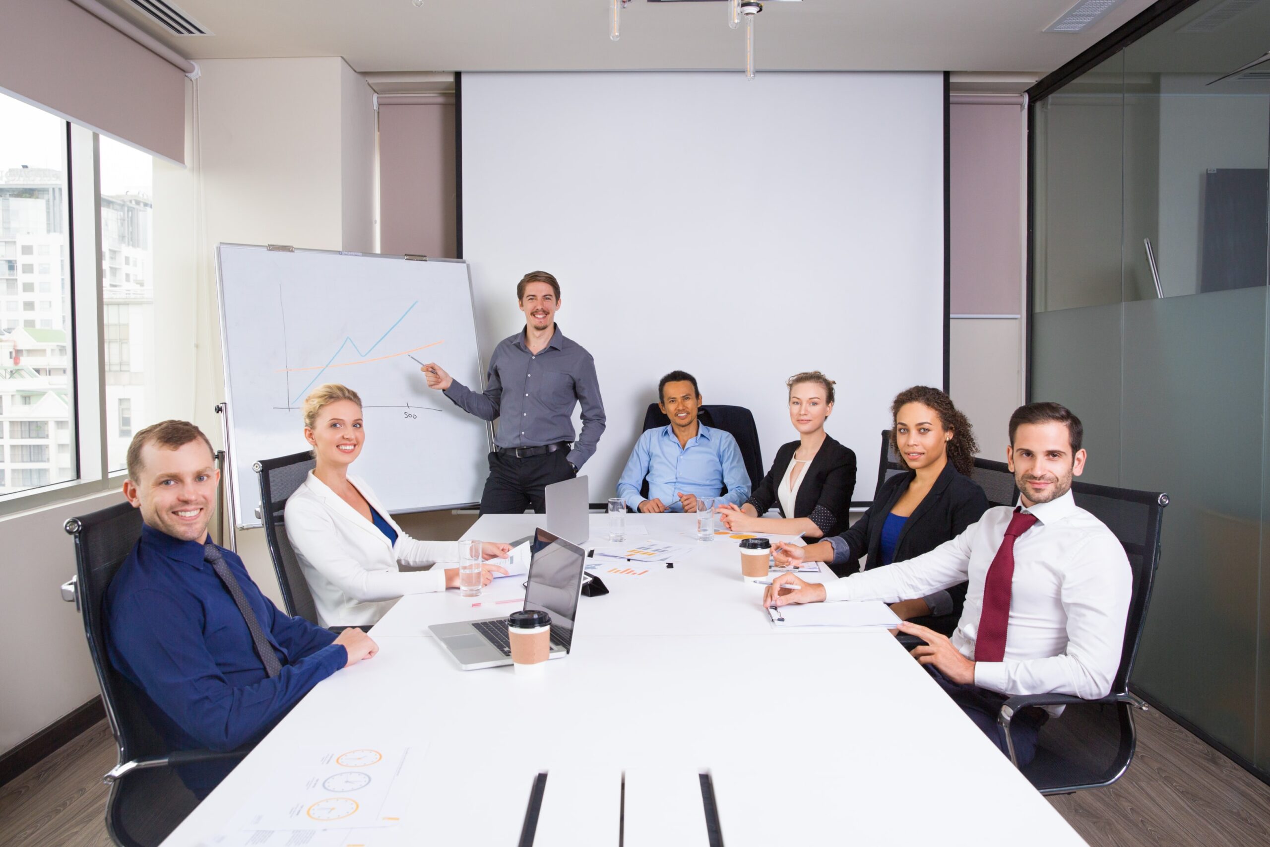 A group of individuals seated at a conference table