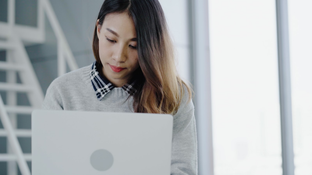 Woman using her laptop