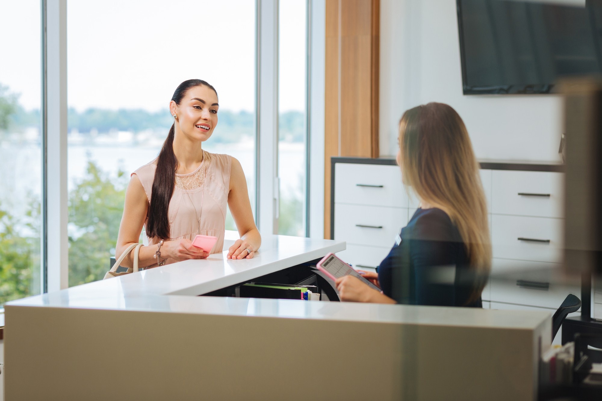 A woman in a front desk